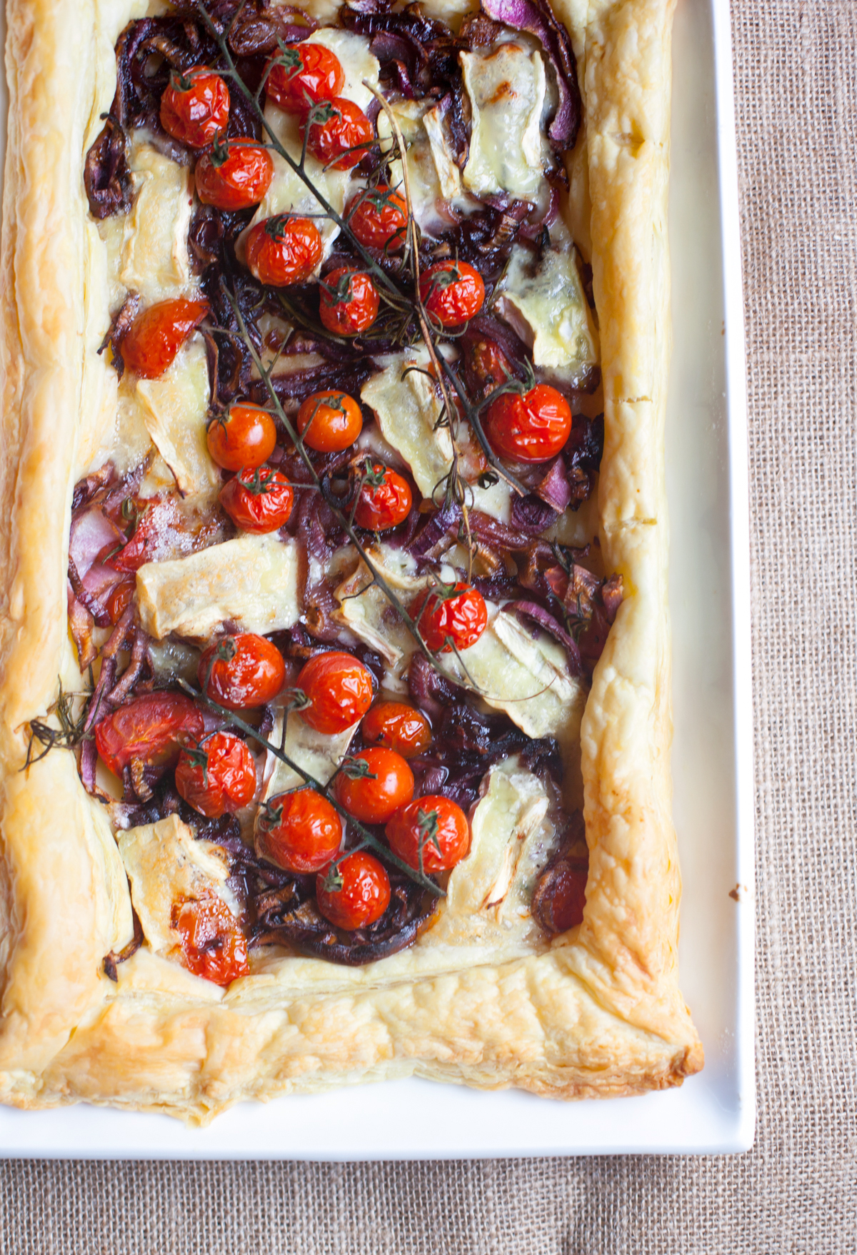 Caramelised Onion, Brie and Cherry Tomato Tart - Made with puff pastry..and completely delicious!